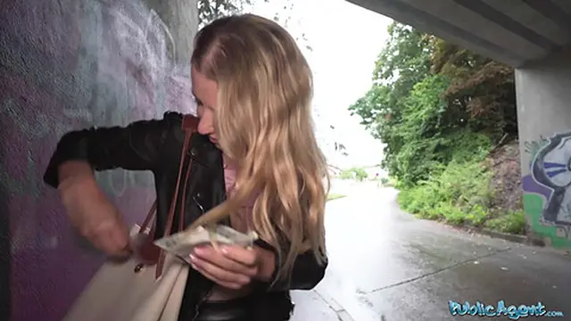 Rain-soaked blonde caught by a public agent in a steamy encounter