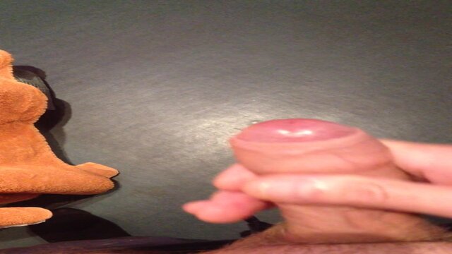 Firm foreskin wraps around his stiff dick during playful stroking session