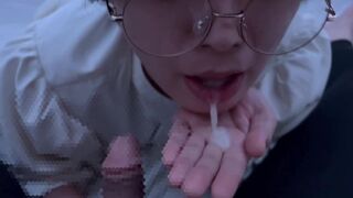 Cumshot while wearing glasses in mouth